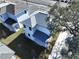 Aerial shot showcasing the property's location in a vibrant neighborhood surrounded by mature trees at 2404 1/2 E Chelsea, Tampa, FL 33610