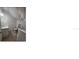 Bathroom featuring neutral tile flooring, a modern vanity, toilet and glass shower at 2404 1/2 E Chelsea, Tampa, FL 33610