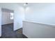 Hallway area showcasing the entry to a bedroom with neutral walls and carpeted flooring at 2404 1/2 E Chelsea, Tampa, FL 33610