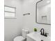Updated bathroom, featuring a white vanity and black matte fixtures at 815 St Francis St, Brooksville, FL 34601