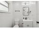 Clean bathroom with white vanity, black fixtures, and a shower/tub combo at 815 St Francis St, Brooksville, FL 34601