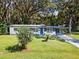 Updated Ranch home with a blue door and carport at 815 St Francis St, Brooksville, FL 34601