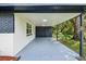 Covered patio with concrete flooring, providing shaded outdoor space at 815 St Francis St, Brooksville, FL 34601