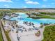 Resort-style community pool with expansive deck and waterslide at 8861 Forge Breeze Loop, Wesley Chapel, FL 33545