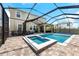 Inviting pool and spa with a screened enclosure at 8861 Forge Breeze Loop, Wesley Chapel, FL 33545