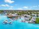 Lagoon pool with floating cabanas and multiple lounge areas at 8861 Forge Breeze Loop, Wesley Chapel, FL 33545