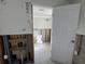 A toilet and sink are visible in this dated bathroom at 2704 2Nd St # 7, Indian Rocks Beach, FL 33785
