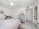 Spacious bedroom with a queen bed, dresser, and plenty of closet space at 2704 2Nd St # 7, Indian Rocks Beach, FL 33785