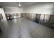 Unfinished living room with exposed walls and tiled floor at 2704 2Nd St # 7, Indian Rocks Beach, FL 33785