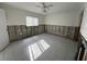 Renovation in progress: bedroom with exposed framing and new tile flooring at 2704 2Nd St # 7, Indian Rocks Beach, FL 33785