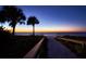 Scenic beach access path at sunset, leading to sandy shores at 2704 2Nd St # 7, Indian Rocks Beach, FL 33785