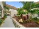 Landscaped garden with stonework and tropical plants at 2704 2Nd St # 7, Indian Rocks Beach, FL 33785