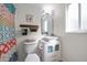 Clean bathroom with updated vanity, toilet and shower at 2704 2Nd St # 7, Indian Rocks Beach, FL 33785