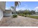 Paved brick driveway leading to a white home at 8002 Lake Dr, Palmetto, FL 34221