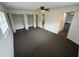 Bedroom with ceiling fan and access to bathroom at 12026 Boynton Ln # Gb32, New Port Richey, FL 34654