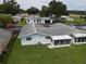 Single-story home with a screened patio, and a large backyard at 12026 Boynton Ln # Gb32, New Port Richey, FL 34654