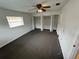 Bright bedroom with ceiling fan and large closet at 12026 Boynton Ln # Gb32, New Port Richey, FL 34654