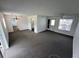 Living room with neutral carpeting and an open floor plan at 12026 Boynton Ln # Gb32, New Port Richey, FL 34654