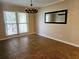 Bright dining room with tile floor and chandelier at 3582 Fairway Forest Dr, Palm Harbor, FL 34685