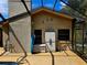 Single-story house with a gray roof and white walls, driveway, and green lawn at 3582 Fairway Forest Dr, Palm Harbor, FL 34685