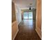 Home entryway with tile floors and view into living room with pool view at 3582 Fairway Forest Dr, Palm Harbor, FL 34685