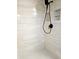 Large walk-in shower with modern tile and fixtures at 3582 Fairway Forest Dr, Palm Harbor, FL 34685