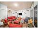 Relaxing sunroom with wicker furniture and tiled floor at 250 Rosery Nw Rd # 351, Largo, FL 33770