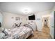 Comfortable bedroom with tiled floors and plenty of natural light at 250 Rosery Nw Rd # 351, Largo, FL 33770