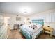 Bright bedroom with a teal bed frame and built-in closet at 250 Rosery Nw Rd # 351, Largo, FL 33770