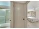 View of the bathroom from bedroom at 1400 Tarpon Woods Blvd # B5, Palm Harbor, FL 34685