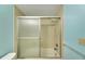 Bathroom with tub and shower combination at 1400 Tarpon Woods Blvd # B5, Palm Harbor, FL 34685