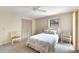 Bedroom with a double bed and two chairs at 1400 Tarpon Woods Blvd # B5, Palm Harbor, FL 34685