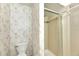 Bathroom with toilet and shower stall at 1400 Tarpon Woods Blvd # B5, Palm Harbor, FL 34685