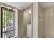 Laundry room with washer, dryer, and shelving at 1400 Tarpon Woods Blvd # B5, Palm Harbor, FL 34685