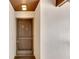 Condo building entry door at 1400 Tarpon Woods Blvd # B5, Palm Harbor, FL 34685