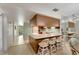 Kitchen features wood cabinets and a breakfast bar at 1400 Tarpon Woods Blvd # B5, Palm Harbor, FL 34685