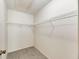 Spacious walk-in closet with wire shelving at 1400 Tarpon Woods Blvd # B5, Palm Harbor, FL 34685