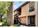 Condo building exterior with stairs at 1400 Tarpon Woods Blvd # B5, Palm Harbor, FL 34685