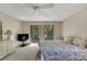 Spacious bedroom with large windows and a view at 1400 Tarpon Woods Blvd # B5, Palm Harbor, FL 34685