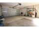 Clean and organized garage with storage shelving and overhead door at 10698 117Th Way, Largo, FL 33778