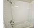 Clean bathroom with white tiled shower and tub at 2525 W Bay Dr # B32, Largo, FL 33770