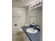 Clean and bright bathroom with vanity sink and tiled flooring at 2525 W Bay Dr # B32, Largo, FL 33770
