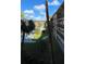 Community pool surrounded by lush landscaping at 2525 W Bay Dr # B32, Largo, FL 33770