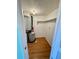 Laundry room with water heater and storage shelves at 2525 W Bay Dr # B32, Largo, FL 33770