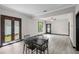Bright dining area with dark wood accents and modern flooring at 402 E Emma St, Tampa, FL 33603