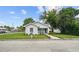 Charming bungalow style home with a well-maintained lawn at 402 E Emma St, Tampa, FL 33603