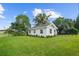Newly renovated home with a well-manicured lawn at 402 E Emma St, Tampa, FL 33603