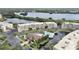 Aerial view of community with pool and pond at 6450 Shoreline Dr # 9405, St Petersburg, FL 33708