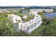 Aerial view of community, showing buildings and lake at 6450 Shoreline Dr # 9405, St Petersburg, FL 33708