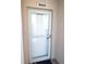 Front door entry to condo unit with security door at 6450 Shoreline Dr # 9405, St Petersburg, FL 33708